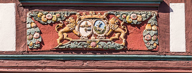 traditional carving at an half timbered house with symbols