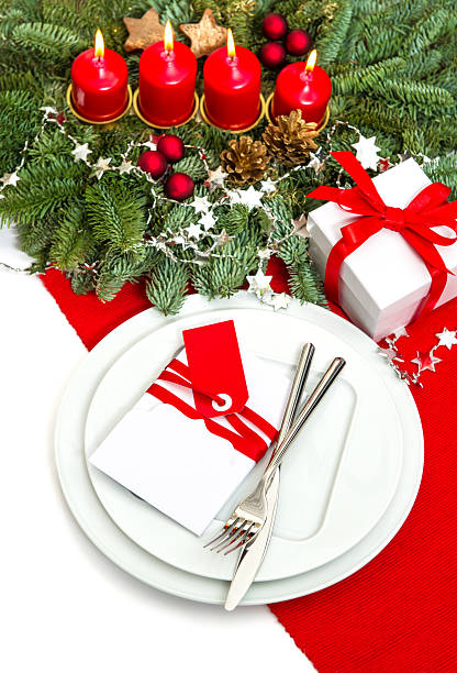 istock christmas table place setting decoration in red and white 488282799