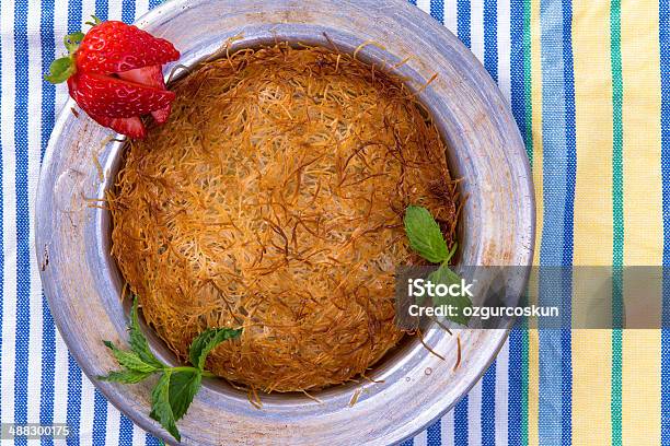 Kunefe Turkish Dessert On A Picnic Cloth Stock Photo - Download Image Now - Baked Pastry Item, Cheese, Cooking