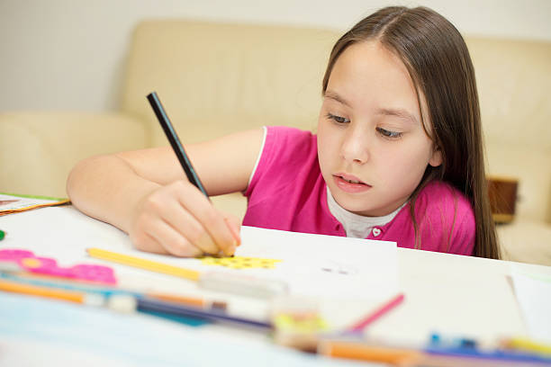 istock Young girl painting 488304835