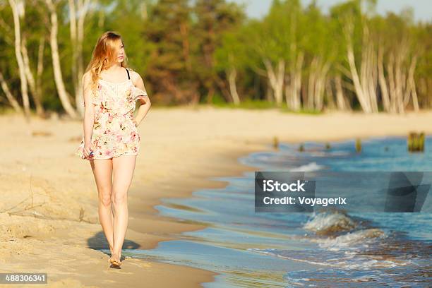 Summer Vacation Girl Walking Alone On The Beach Stock Photo - Download Image Now - Adult, Adults Only, Beach