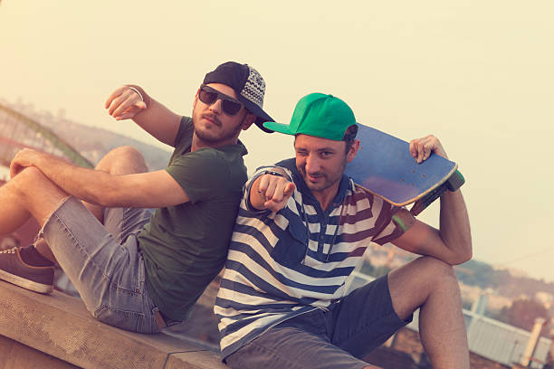 istock Two young skater having fun outdoors. 488308322