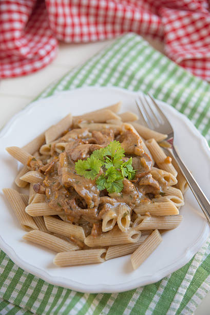 istock Pasta with chanterelle mushrooms 488310322