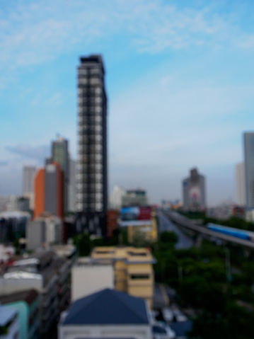 Abstract blured of Bangkok cityscape in evening background