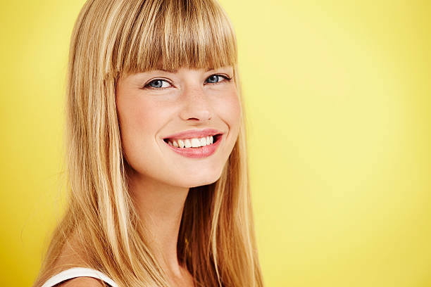 istock Young woman smiling with confidence 488311948