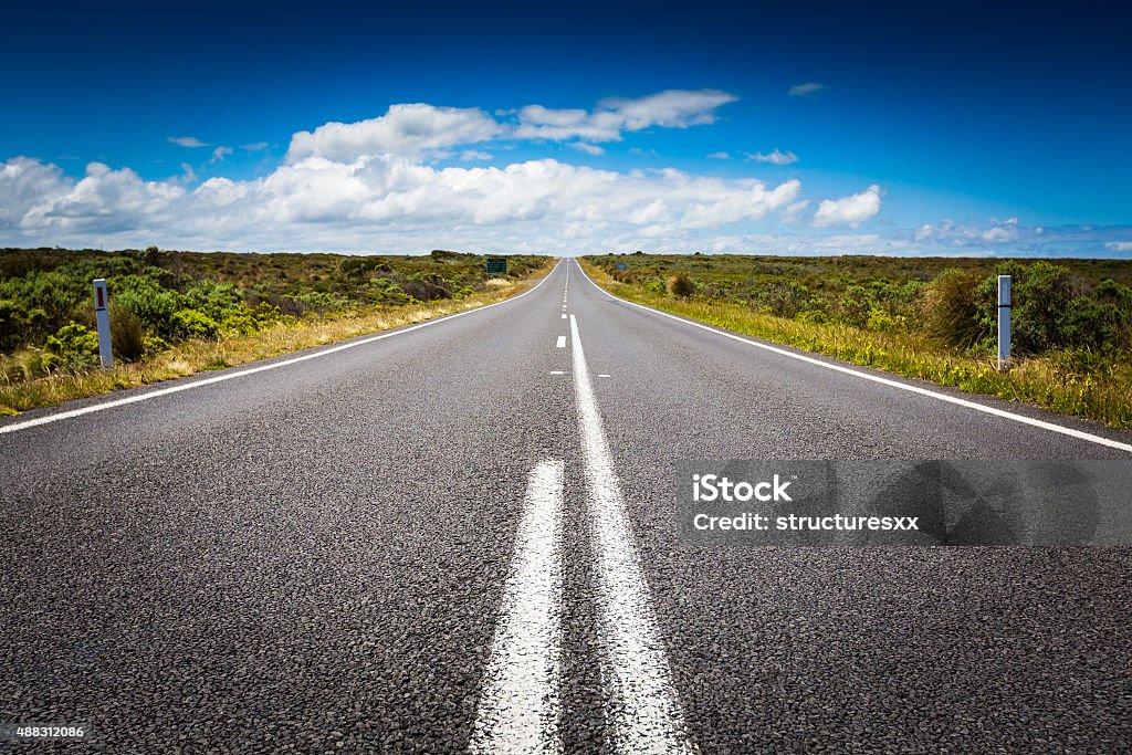 The long road and blue sky in Victoria, Australia Road Stock Photo