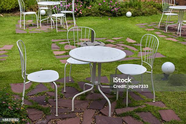 White Steel Table And Chairs Outside Stock Photo - Download Image Now - 2015, Beauty, Chair