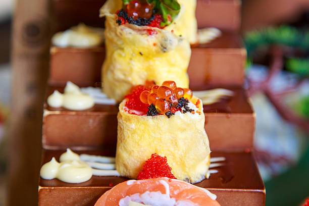 egg and cheese roll with salmon egg sushi Japanese food