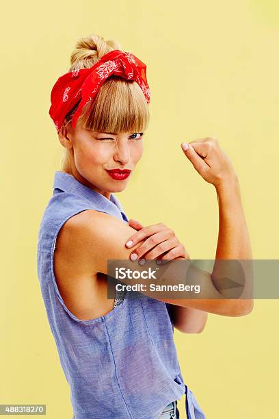 Beautiful Woman Flexing Muscle Stock Photo - Download Image Now - Girl Power, Strength, One Woman Only