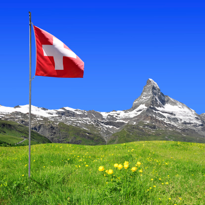 Matterhorn with Swiss flag - Swiss alps