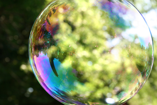 A close up of a bubble floating in the air