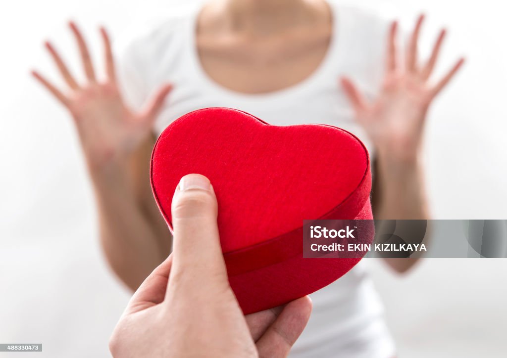 Giving present Woman taking gift from someone. Adult Stock Photo