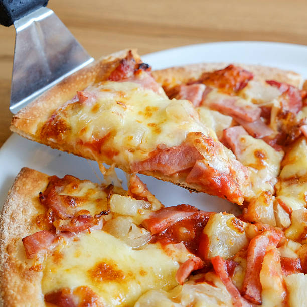 istock delicious hawaiian rustic style pizza made with fresh pineapples 488349860