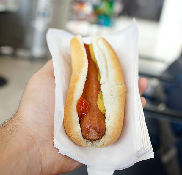 istock Classic hot dog with mustard and ketchup 488351756