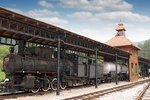istock railway station with old steam locomotive 488352572