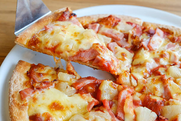 istock delicious hawaiian rustic style pizza made with fresh pineapples 488353394