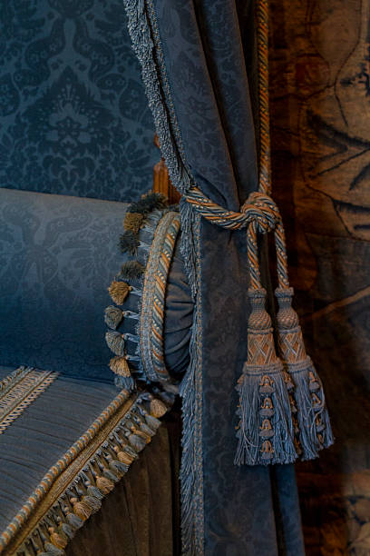 istock Decorative renaissance style blue bed and curtain fabric 488354834