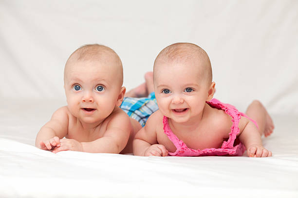 istock Two happy child on a white background 488356752