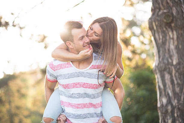 istock Couple having fun at the park 488356940
