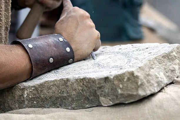 Stone carving - reconstruction of medieval stone work .