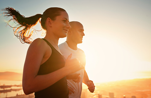 Shot of a young couple running together outsidehttp://195.154.178.81/DATA/i_collage/pi/shoots/783460.jpg