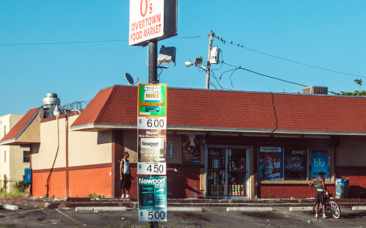 Miami, USA - March 4, 2014: A few people infront of food market in Overtown district.