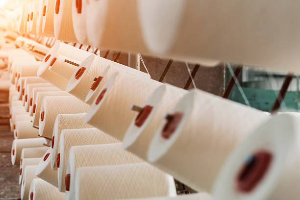 istock cotton fabric for clothing cloth textile manufacture on machine 488358498