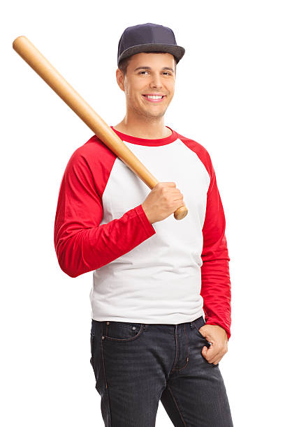 istock Male baseball player holding a baseball bat 488359360