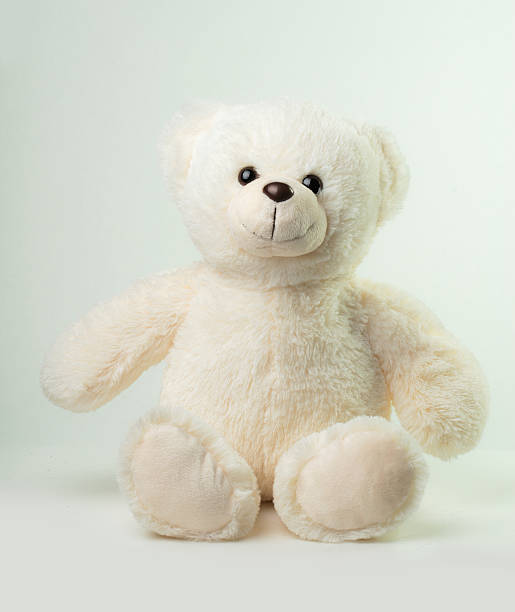 seduto bianco orsetto - teddy bear baby toy stuffed animal foto e immagini stock