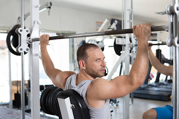 istock Man working out at the gym 488362350