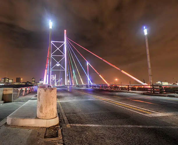 Nelson Mandela Bridge at night. The 284 metre long Nelson Mandela Bridge, officially opened by Nelson Mandela himself, which crosses over the 40 railway lines that lie spread beneath its span.