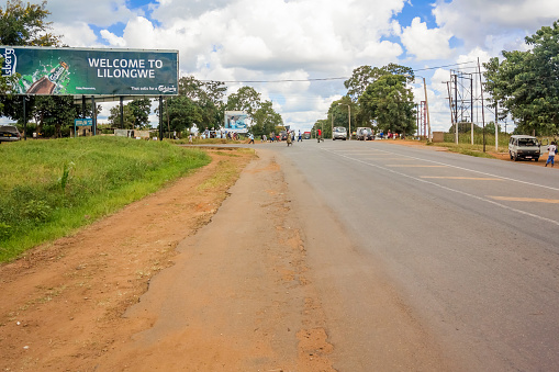 Lilongwe, Malawi - March 28, 2015: Welcome sign on the road to Lilongwe in Malawi.