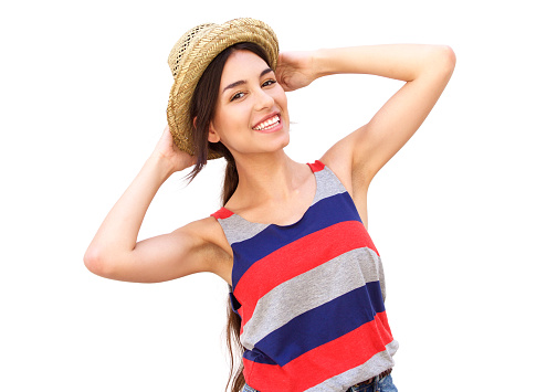 Portrait of a beautiful girl smiling with hat against white background
