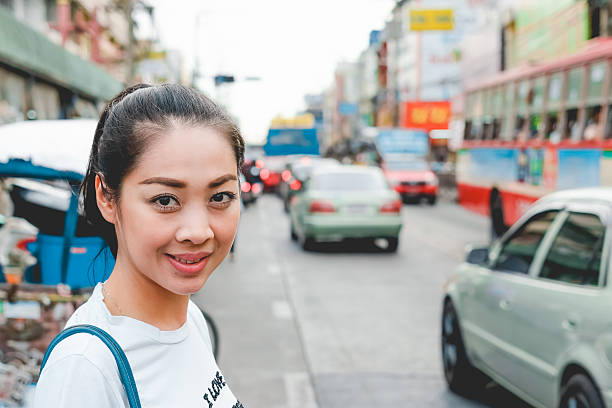 istock Asian woman on street. 488365578