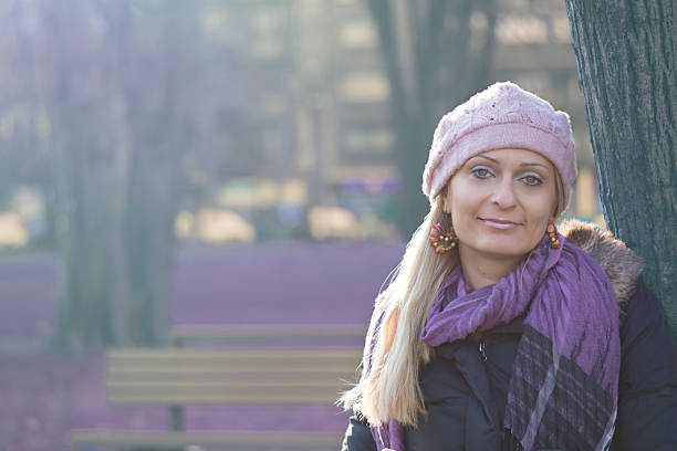 istock Young woman in park 488365675
