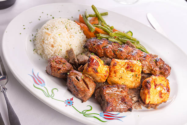 istock Mixed Chicken, Beef, Adana, Doner Kebabs Served with Rice 488366581