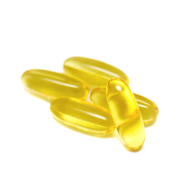 istock Omega 3 capsules from Fish Oil on white background 488368295