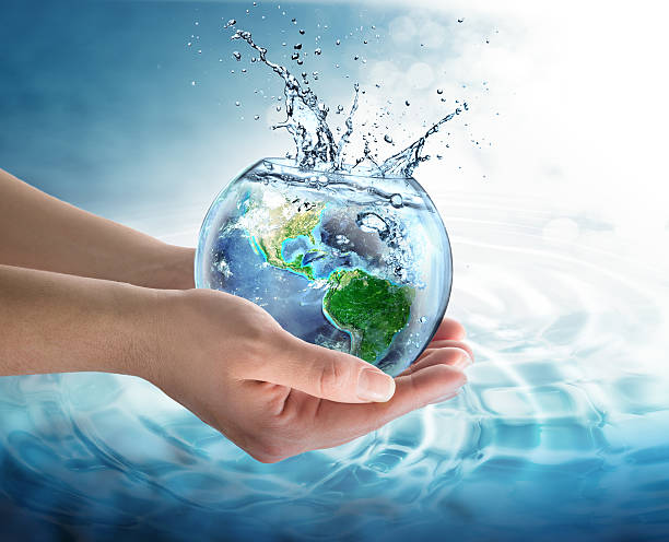conservación del agua en nuestro planeta-ee. uu. - human hand digitally generated image energy green fotografías e imágenes de stock
