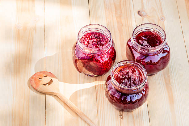 istock Homemade jam on wooden table 488380466