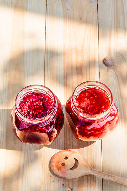 istock Homemade jam on wooden table 488380790