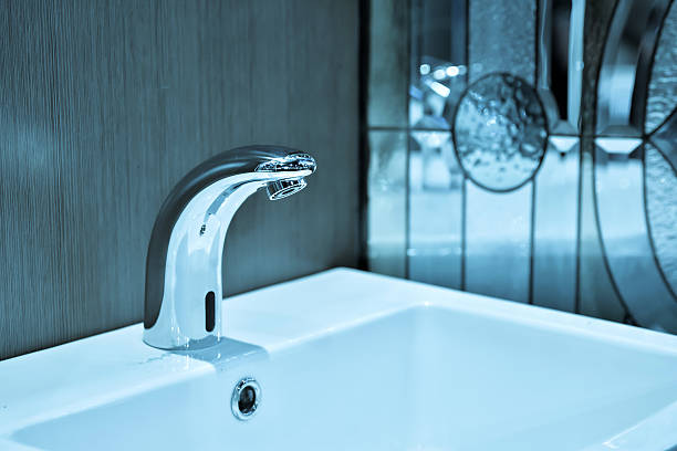 istock Modern faucet and wash basin in luxury bathroom 488382016