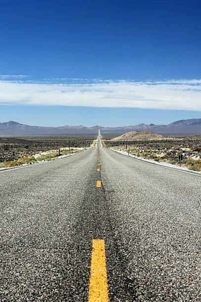 istock Lonely highway in the desert 488385518