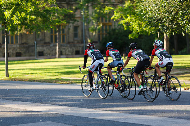 Cycling Cyclists road race riding overhead photo of motion speed blur action.