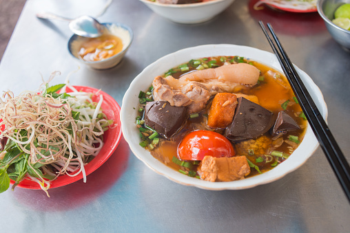 Bun Rieu is one of the famous dishes of Vietnamese cuisine. People often eat them with pork, meat, tofu, tomato, some kinds of vegetables and fish sauce (Nuoc Cham)