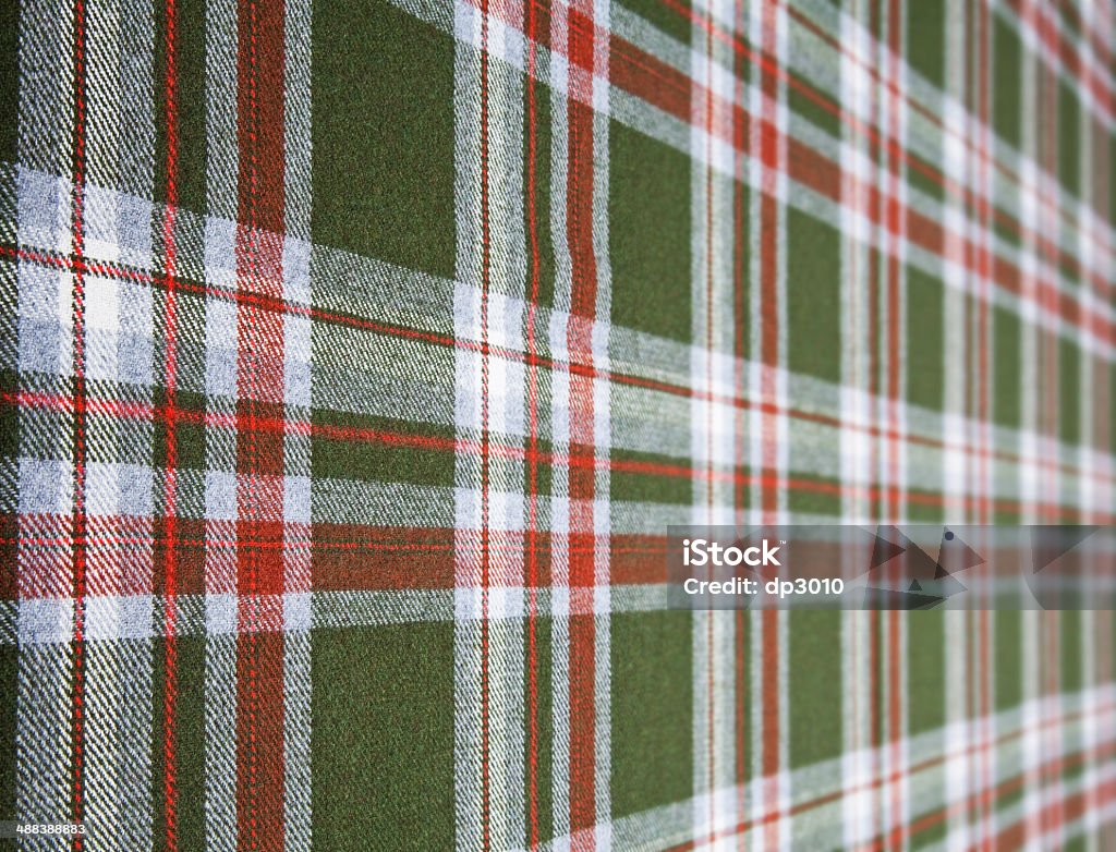 Tartan wool. Red and green tartan fabric. Abstract Stock Photo