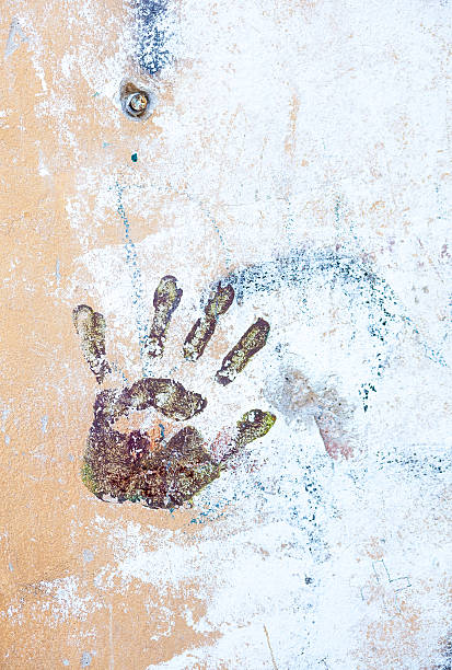 istock Handprint and painting on the wall 488390395
