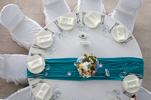 istock Elegance table set up for wedding in turquoise top view 488390718