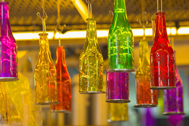 istock Beautiful colorful bottle hanging on the ceiling. 488391096