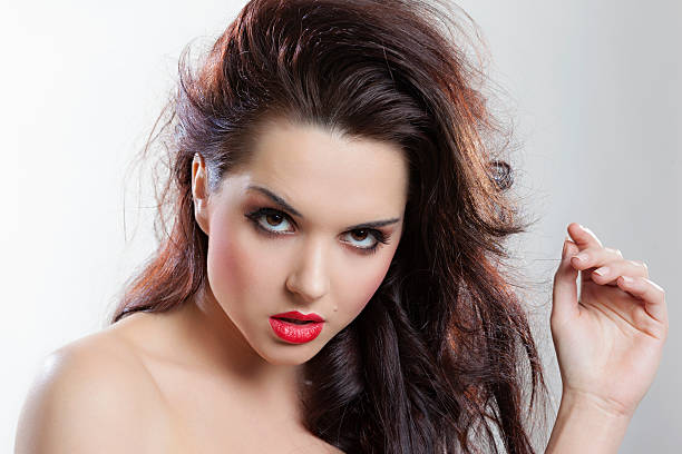 istock Beautiful seductive girl with red lipstick 488391285