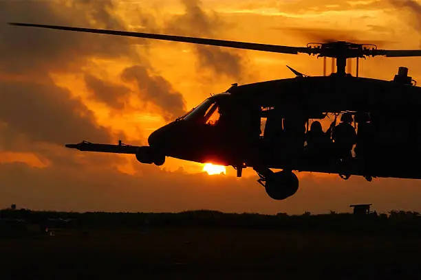 Photo of Helicopter soldiers at sunset